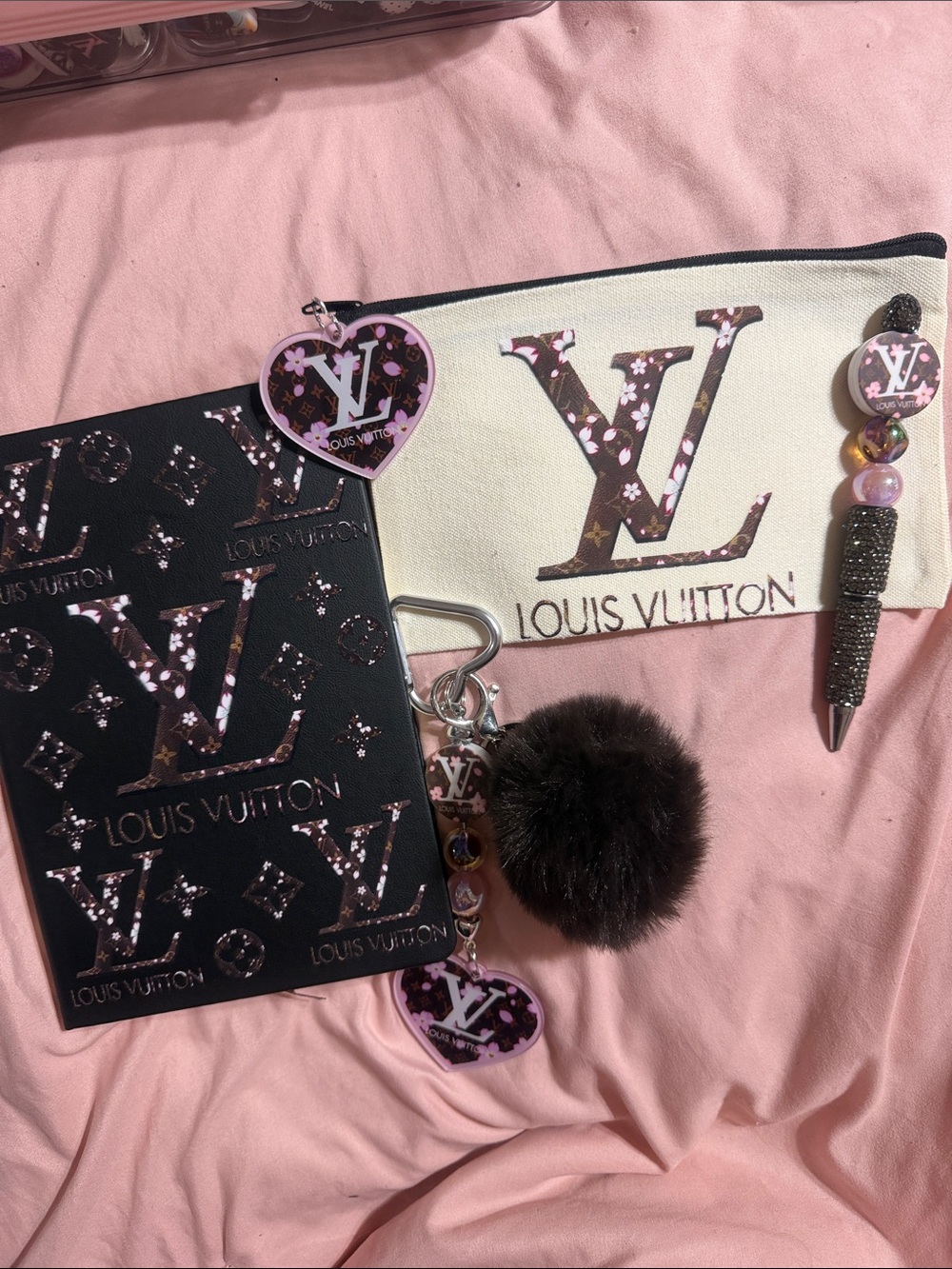Black journal with matching rhinestone pen, keychain and canvas pouch.